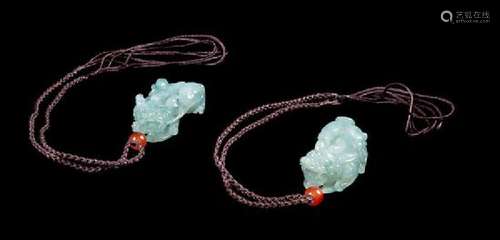 A Pair of Jadeite Figures of Mythical Beasts Length of