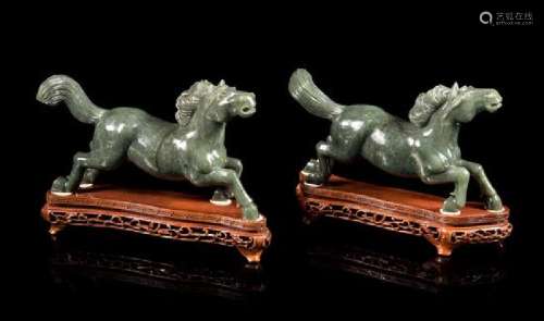 * A Pair of Spinach Jade Figures of Horses Length of