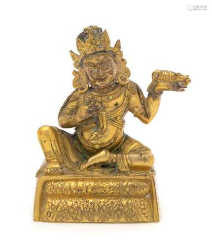 * A Sino-Tibetan Gilt Bronze Figure of Jambhala Height