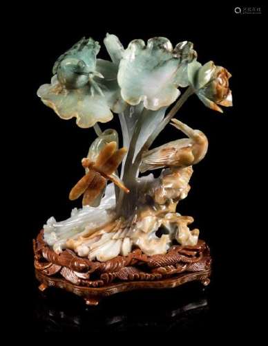 * A Green, Russet and Pale Celadon Jadeite Figural
