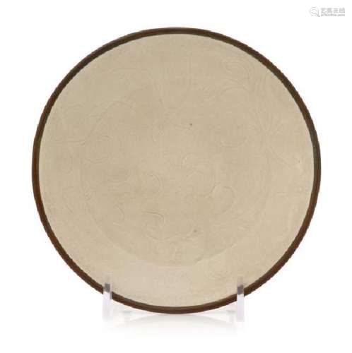 * A Carved Dingyao White Glazed Porcelain 'Lotus' Bowl