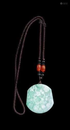 A Celadon and White Jadeite Pendant Length 2 inches.