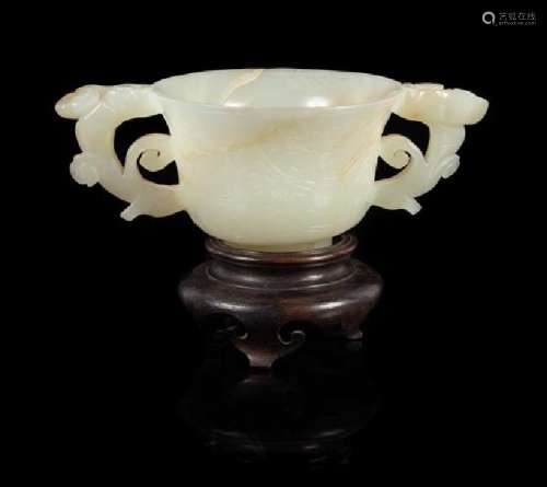 A White Jade Double Handled Cup Length 4 7/8 inches.