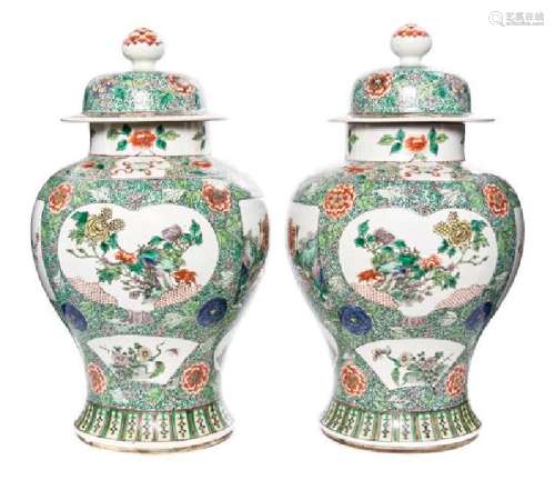 A Pair of Famille Verte Porcelain Jars and Covers