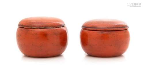 A Pair of Red Lacquered Covered Boxes Diameter of each