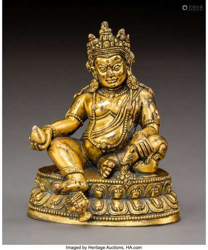 78360: A Tibetan Gilt Bronze Figure of Seated Kubera, 1