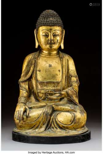 78210: A Chinese Gilt Bronze Figure of Seated Buddha Sh