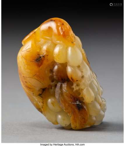 78070: A Chinese Carved White and Russet Jade Squirrel