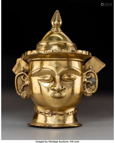 78379: An Indian Gilt Copper Alloy Mohra, 19th century