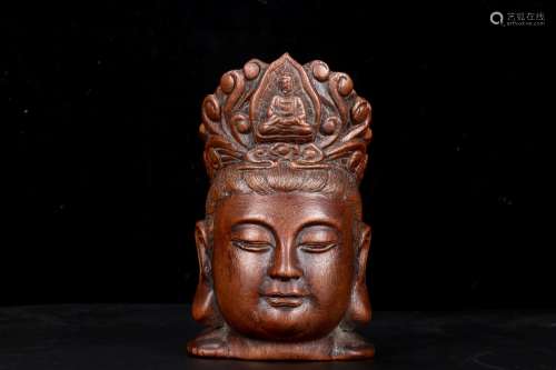 A Qing Huanghuali Carved Buddha Head