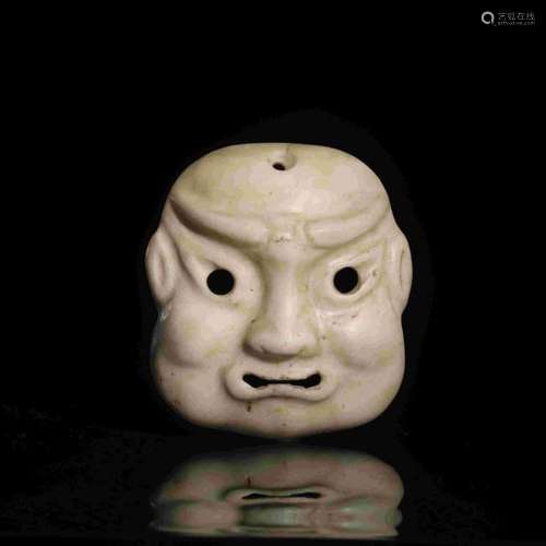 STONE CARVED FACIAL MASK