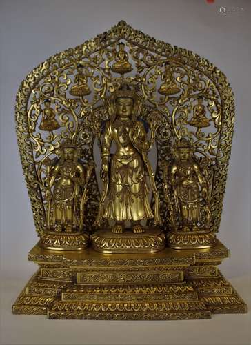 A GILT-BRONZE FIGURE OF MANJUSRI WITH MANDORLA