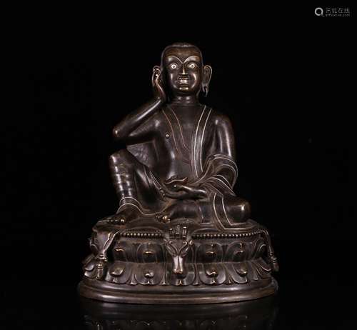 A SINO-TIBETAN SILVER INLAID COPPER ALLOY FIGURE