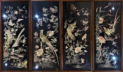 A SET OF FOUR CANTONESE EMBROIDERED SCREEN PANELS