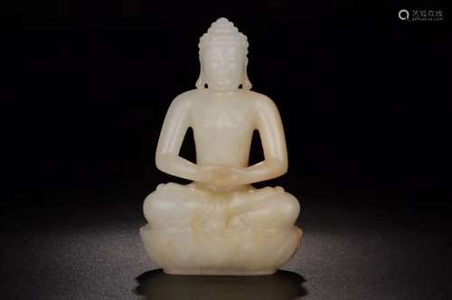 A JADE FIGURE OF SHAKYAMUNI