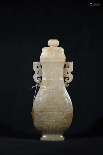 A HETIAN CARVED VASE AND COVER