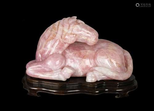 A ROSE QUARTZ FIGURE OF HORSE