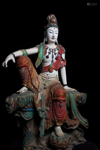 A XIANGZHANG WOOD FIGURE OF