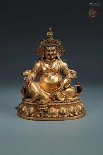 A GILT-BRONZE FIGURE OF BUDDHA