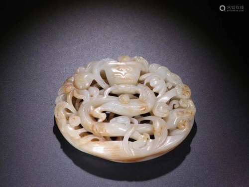 A HETIAN JADE CARVED 'DRAGON' ORNAMENT