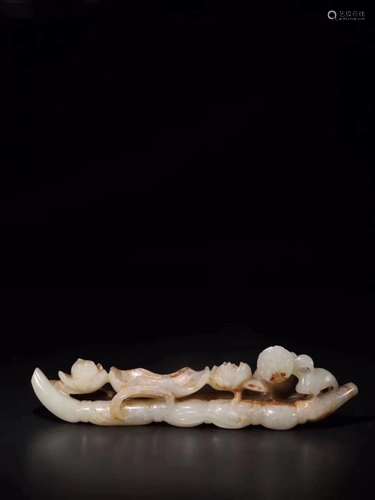 A HETIAN JADE CARVED LOTUS-FORM BRUSH REST