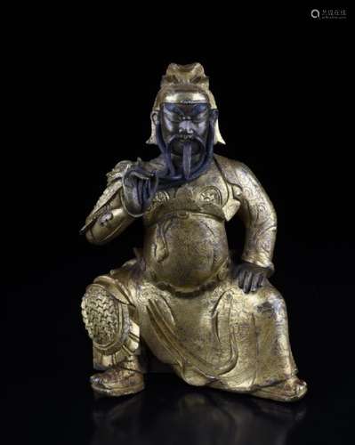 A GILT BRONZE GUANYU FIGURE