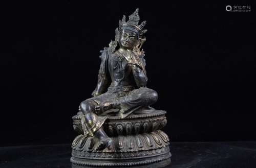 A GILT-BRONZE FIGURE OF TARA