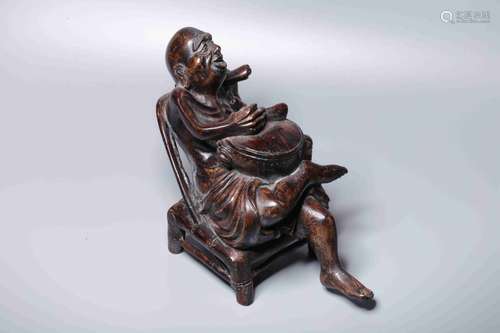 A WOOD FIGURE OF SEATED BUDDHA