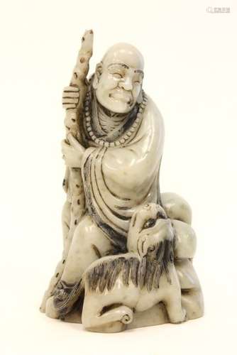 A SOAPSTONE FIGURE OF LUOHAN