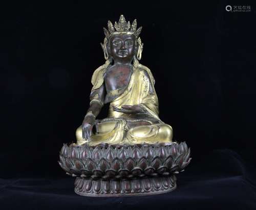 A GILT-BRONZE FIGURE OF SHAKYAMUNI