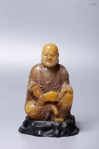 A SOAPSTONE FIGURE OF BUDDHA