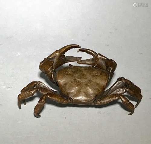 A CARVED BRONZE CRAB