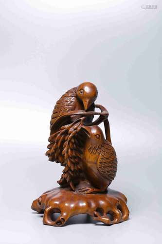 A HUANGYANG WOOD CARVING OF BIRDS