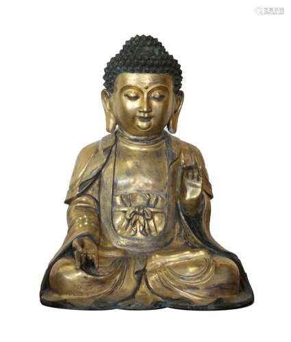 A BRONZE FIGURE OF SHAKYAMUNI