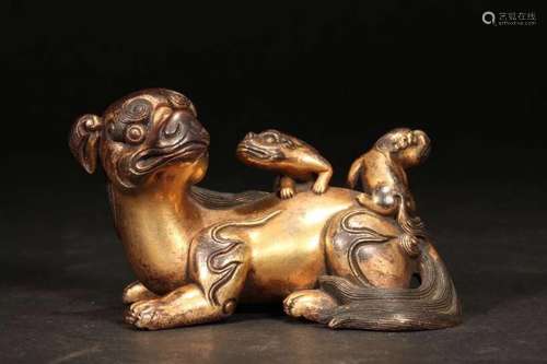 A GILT-BRONZE ANIMAL-FORM PAPER WEIGHT