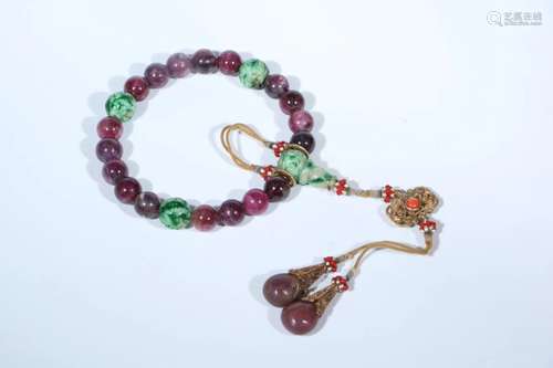 A TOURMALINE AND JADE  BEADS BRACELET