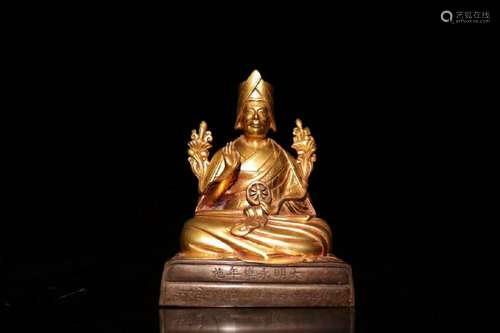 A GILT-BRONZE FIGURE OF BUDDHA