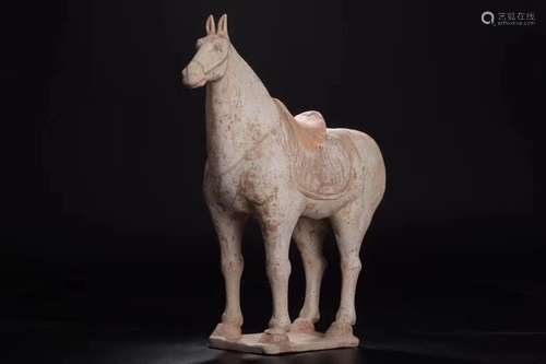 A POTTERY FIGURE OF HORSE