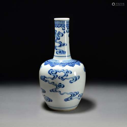 A BLUE AND WHITE BOTTLE VASE