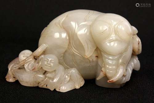 A JADE CARVING OF ELEPHANT AND BOY