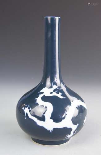 A BLUE GLAZED `DRAGON` BOTTLE VASE