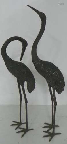 TWO BRONZE HERONS