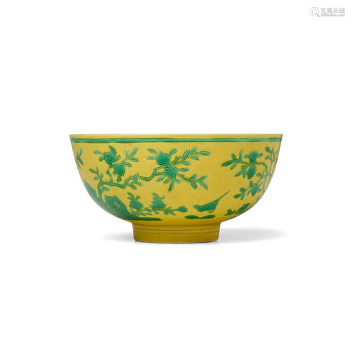 Yongzheng six-character mark and of the period A RARE YELLOW-GROUND GREEN-ENAMELLED 'PEACH AND BIRD' BOWL