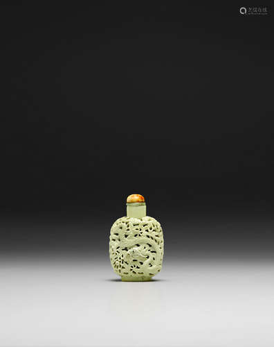 Qianlong mark, 19th century A MOLDED AND RETICULATED PORCELAIN 'DRAGON' SNUFF BOTTLE