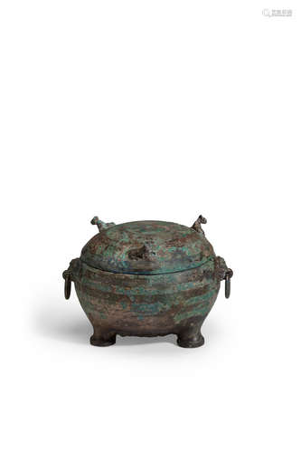 Warring States period, 5th/4th century B.C. AN ARCHAIC BRONZE RITUAL TRIPOD VESSEL AND COVER, DING