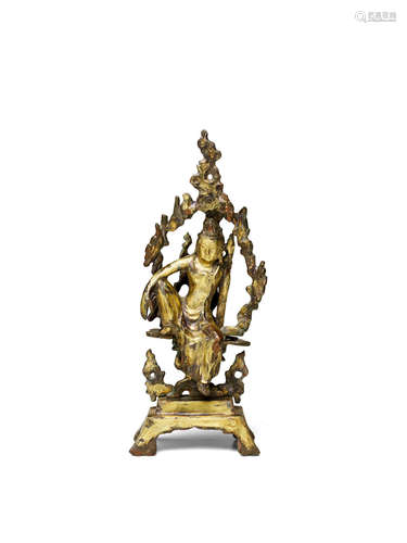 Song dynasty A GILT-BRONZE FIGURE OF GUANYIN IN A GROTTO