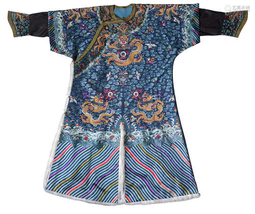 19th century An embroidered blue silk ground fur-lined 'nine dragon' robe, Jifu