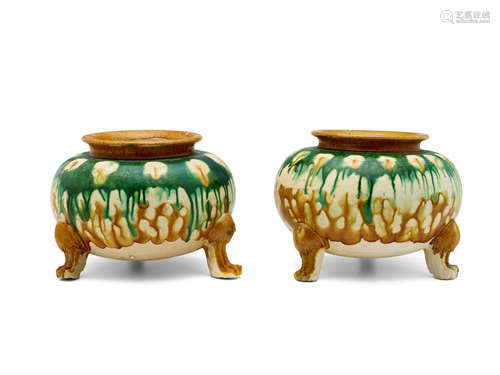 Tang dynasty TWO SANCAI-GLAZED POTTERY TRIPOD JARS