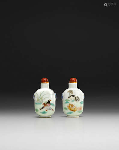 Daoguang mark and of the period A FAMILLE ROSE 'DOVES AND DOGS' SNUFF BOTTLE