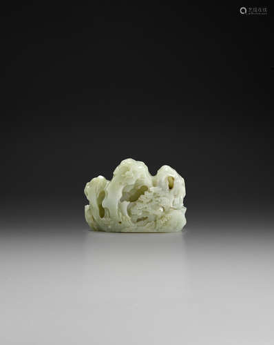 18th/19th century a small pale green jade landscape boulder